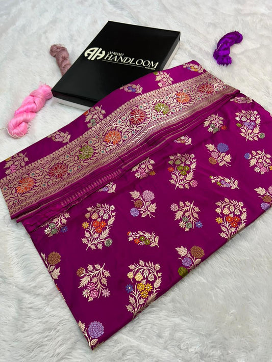 This is a stunning example of a traditional Banarasi Katan Silk Saree in deep magenta purple colour