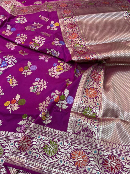 This is a stunning example of a traditional Banarasi Katan Silk Saree in deep magenta purple colour