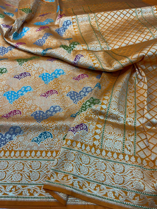 This is a stunning example of Banarasi craftsmanship, specifically a Katan Silk Khimkhab Rankaat Saree.