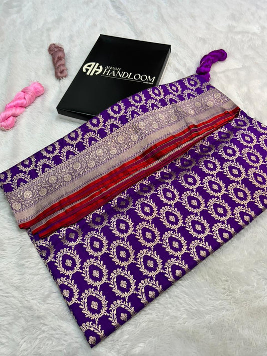 Pure Katan Silk Handloom Saree, featuring traditional Cutwork weaving saree with gold zari in deep royal purple colour