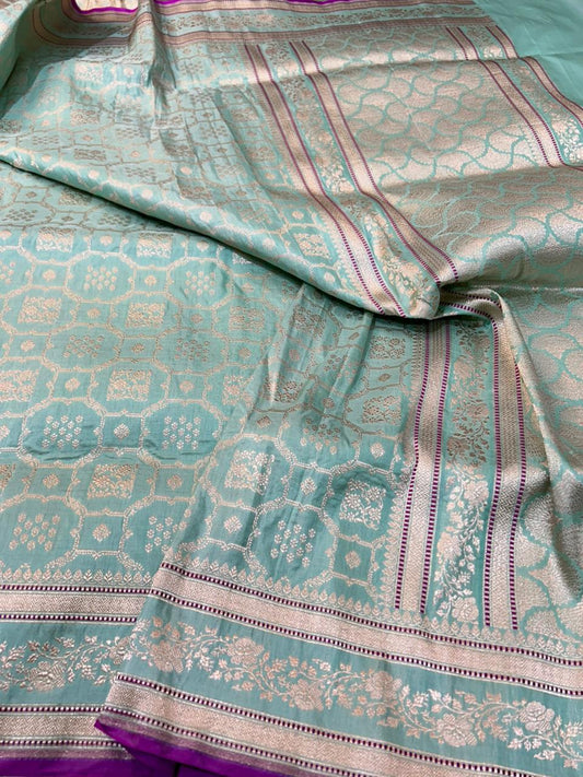 Handloom Banarasi Cutwork Silk Saree in Seafoam Green with Purple Contrasting Border with pure light gold zari