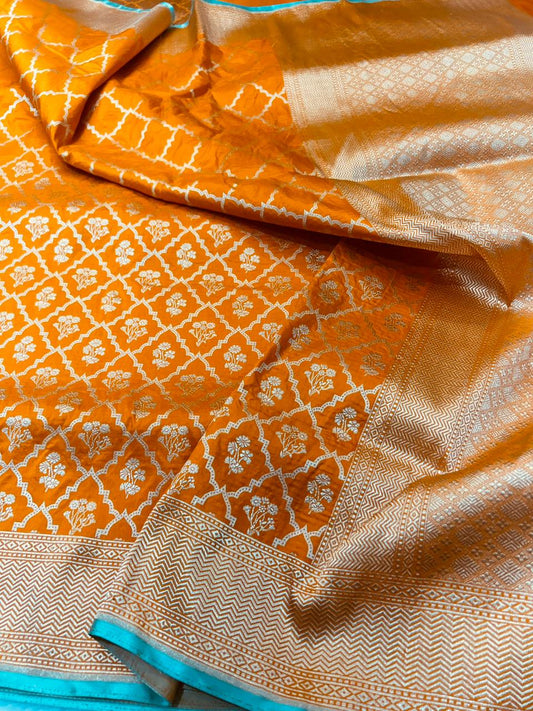 Vibrant fanta-Orange Banarasi Handloom Silk Saree with Intricate Zari Jaal & Contrast Piping
