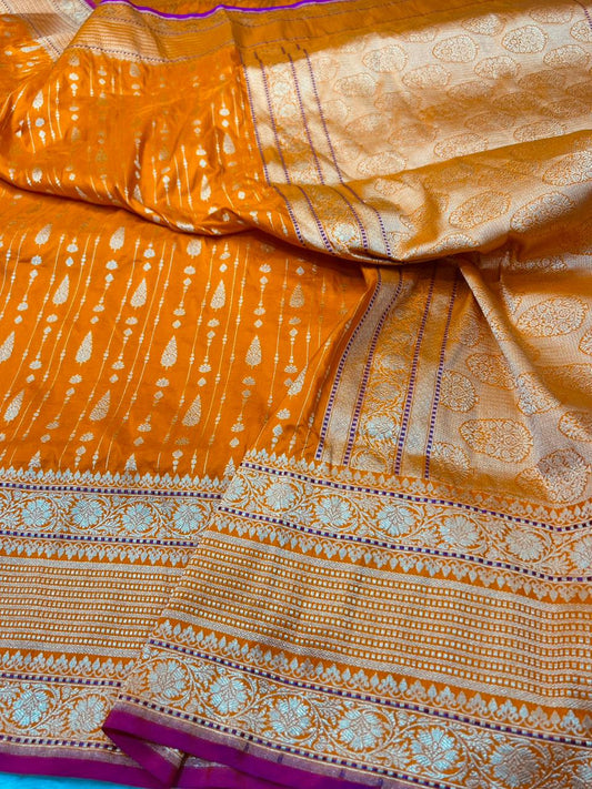 Exquisite Orange Handloom Katan Silk Banarasi Saree with Silver light gold Buta and Meenakari Accents